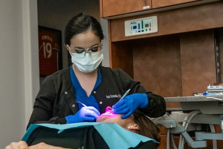 emergency dentist treating a patient